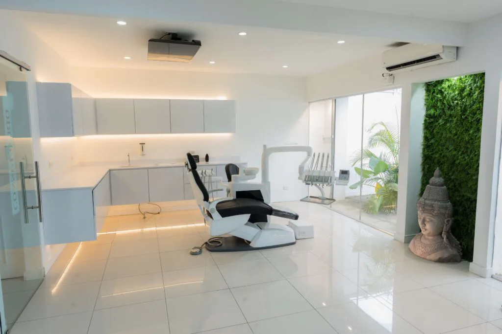 Treatment room with natural light and a living wall