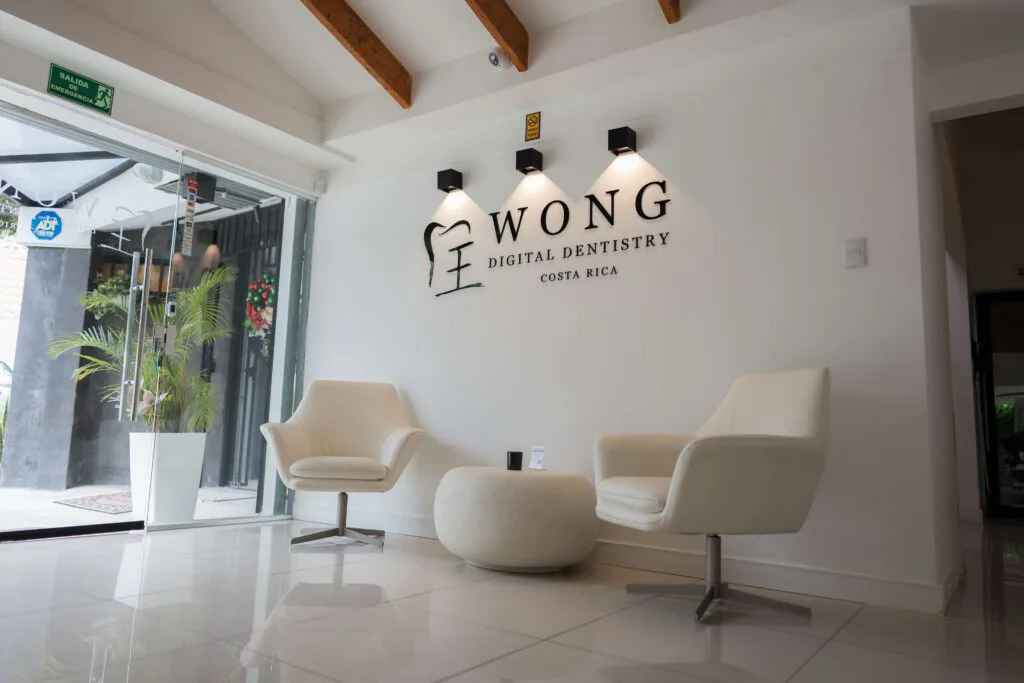Reception area with two white patient chairs